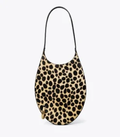 KLEINE HANDTASCHE AUS KALBSHAAR MIT PIERCINGDETAIL