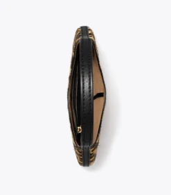 KLEINE HANDTASCHE AUS KALBSHAAR MIT PIERCINGDETAIL