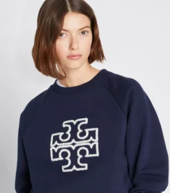 RUNDHALSTOP AUS MERINOFROTTEE MIT RAGLANÄRMELN UND LOGO