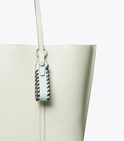 TASCHENANHÄNGER MIT GEWEBTEM LEDER