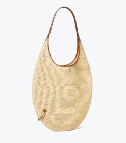 WEICHE STROHTASCHE MIT PIERCINGDETAIL